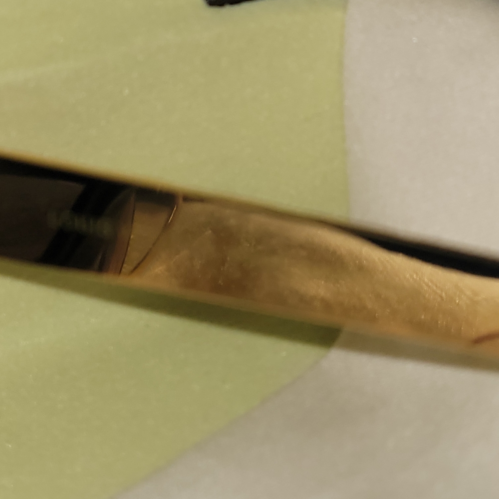Louis Vuitton Elegant Black and Gold Sunglasses - Picture 6 of 6